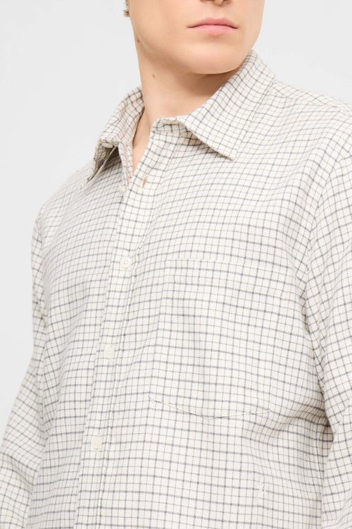 Rodrik white check